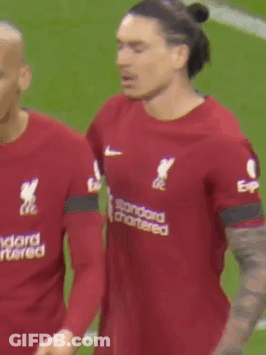 Soccer Player In Red #6 Talking To Another Player GIF