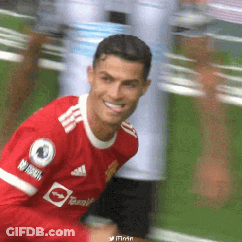 Soccer Player In Red Adidas Jersey Smiling GIF