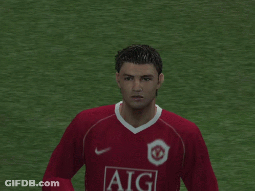 Soccer Player In Red Aig Jersey Raising Fist GIF