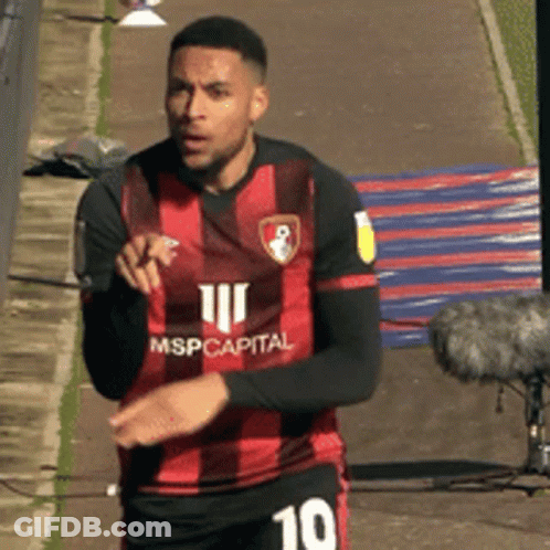 Soccer Player In Red And Black Jersey GIF