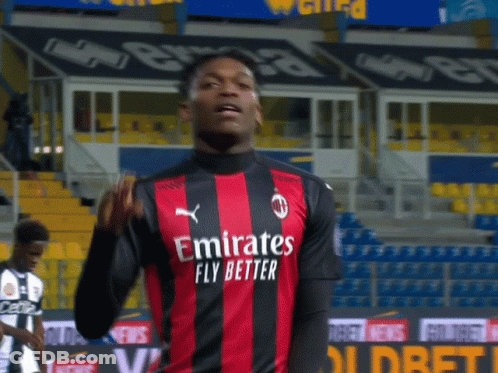 Soccer Player In Red And Black Jersey GIF