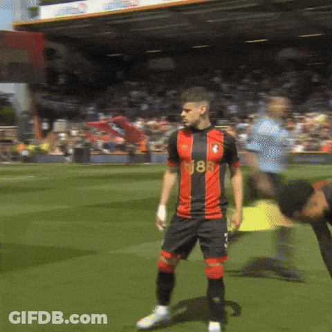 Soccer Player In Red And Black Jersey Number 18 GIF