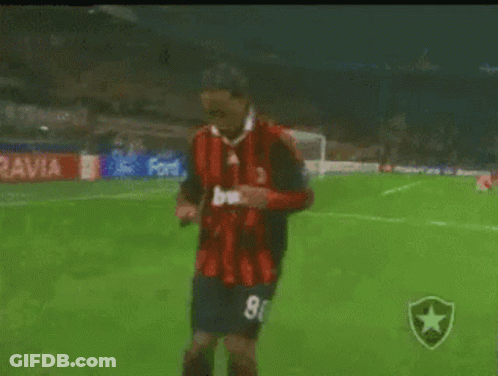 Soccer Player In Red And Black Jersey Number 8 GIF