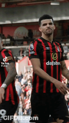 Soccer Player In Red And Black Jersey Saying Dafabe GIF