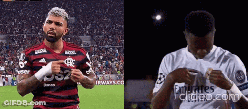 Soccer Player In Red And Black Pointing At White Emirates Jersey GIF