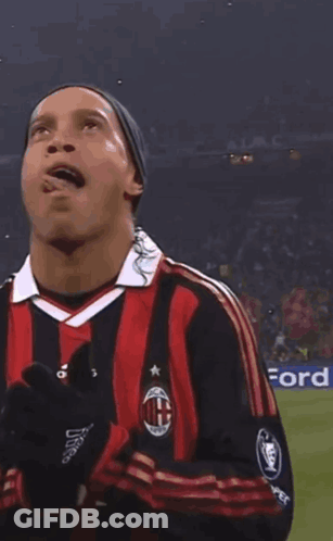 Soccer Player In Red And Black Striped Adidas Jersey GIF