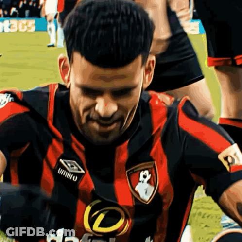 Soccer Player In Red And Black Umbro Jersey GIF