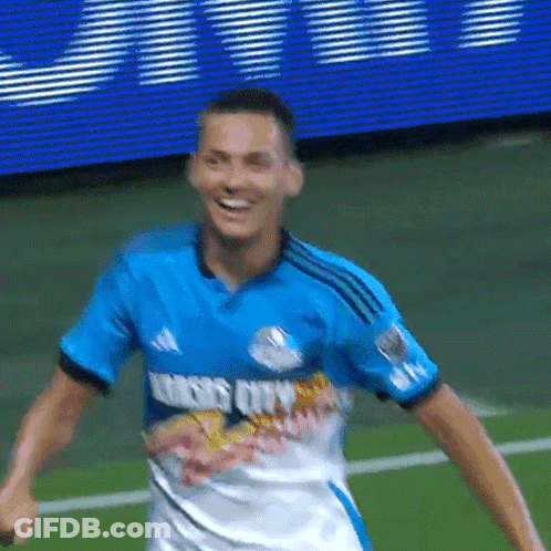 Soccer Player In Red And Blue Striped Jersey With O GIF