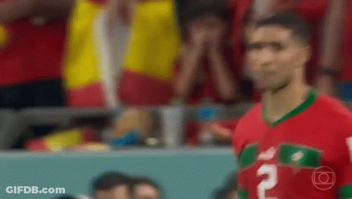 Soccer Player In Red And Green Jersey GIF
