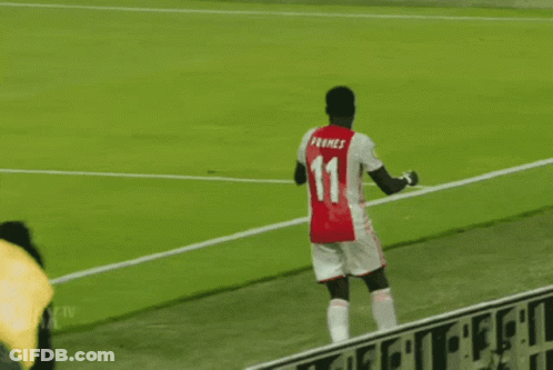 Soccer Player In Red And White Ajax Jersey GIF