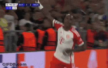 Soccer Player In Red And White Jersey Celebrates Goal Against Bayern Munich GIF