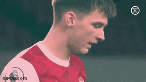 Soccer Player In Red And White Jersey Close-Up GIF