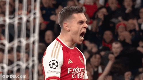 Soccer Player In Red And White Jersey With Emirates GIF