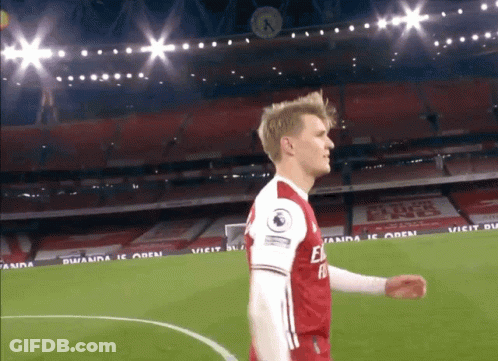 Soccer Player In Red And White Jersey With Fly Emirates GIF