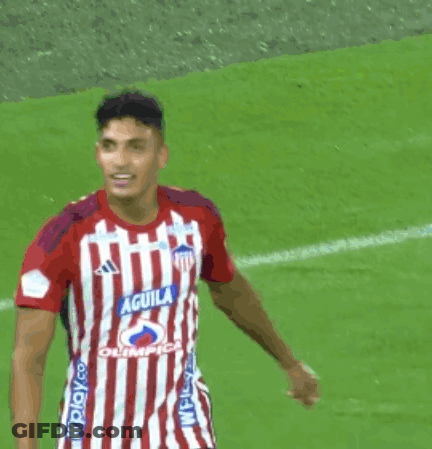 Soccer Player In Red And White Striped Jersey Saying Aguila GIF