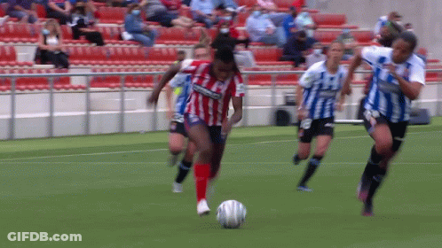 Soccer Player In Red And White Striped Shirt Kicking Ball GIF