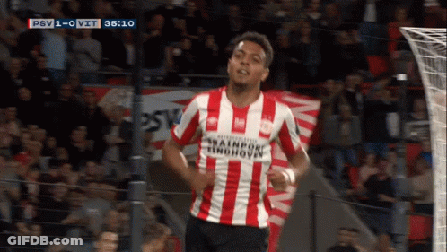 Soccer Player In Red And White Striped Shirt Saying Trainport Eindhoven GIF