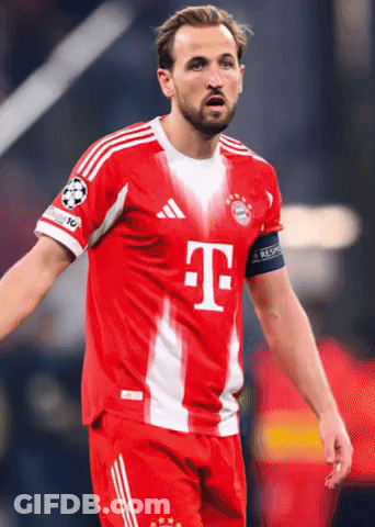 Soccer Player In Red And White Uniform With Letter T GIF