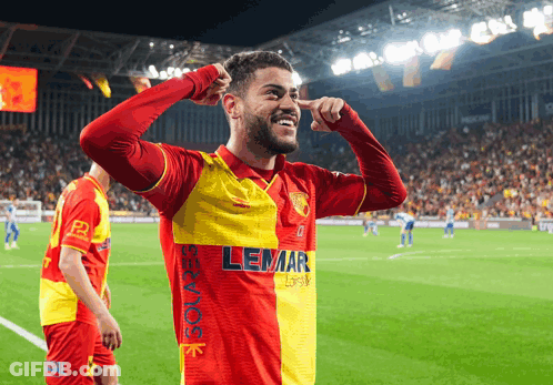 Soccer Player In Red And Yellow Lemar Shirt GIF