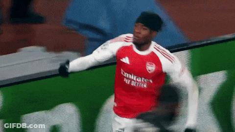 Soccer Player In Red Emirates Fly Better Jersey GIF