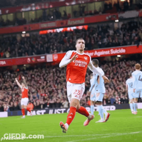 Soccer Player In Red Emirates Fly Better Jersey Running GIF