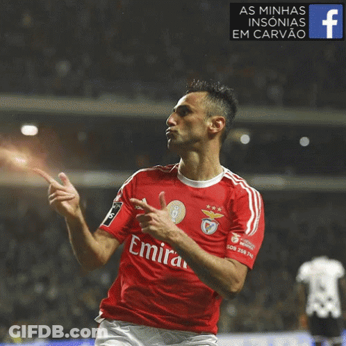 Soccer Player In Red Emirates Jersey Celebrating Goal GIF