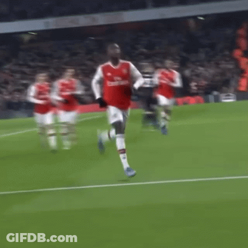 Soccer Player In Red Emirates Jersey Running GIF