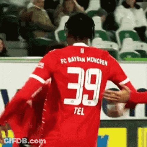Soccer Player In Red Jersey 39 Hugged By Fan GIF