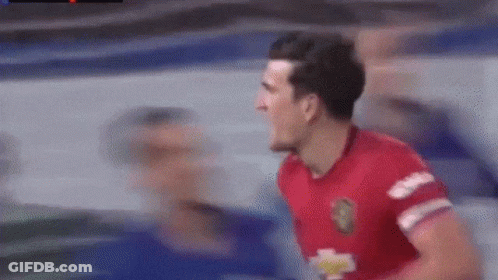 Soccer Player In Red Jersey Celebrating Goal GIF