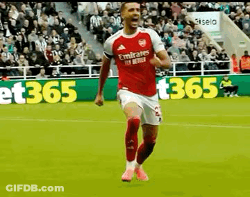 Soccer Player In Red Jersey Celebrating Goal GIF