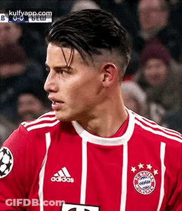 Soccer Player In Red Jersey Close Up GIF