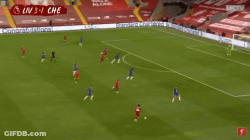 Soccer Player In Red Jersey In Front Of Goal GIF