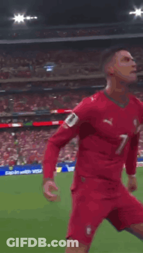 Soccer Player In Red Jersey Number 7 Kicking Ball GIF