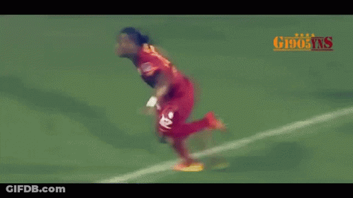 Soccer Player In Red Jersey Number 7 Running GIF