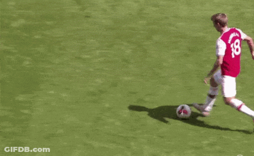 Soccer Player In Red Jersey Number 8 Kicking Ball GIF