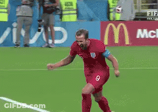 Soccer Player In Red Jersey Number 9 Celebrating Goal GIF