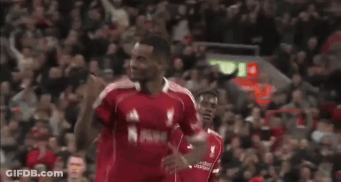 Soccer Player In Red Jersey Running To Goal GIF