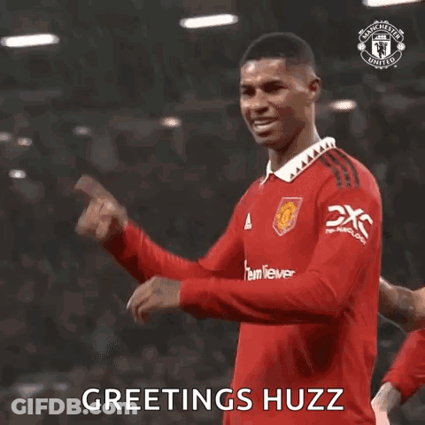 Soccer Player In Red Jersey Saying Greetings GIF