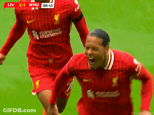 Soccer Player In Red Jersey Saying Standard Chartered GIF