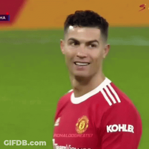 Soccer Player In Red Jersey Smiling GIF