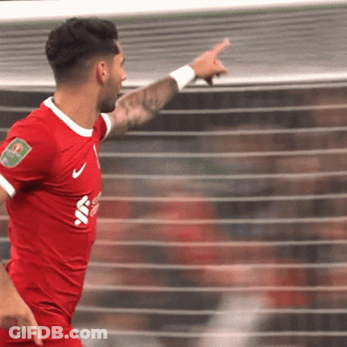 Soccer Player In Red Jersey With Santander Badge GIF