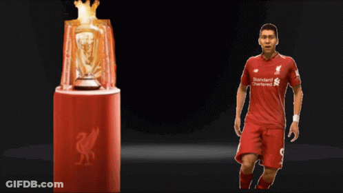 Soccer Player In Red Jersey With Standard Chartered GIF