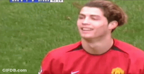 Soccer Player In Red Nike Jersey On Field GIF