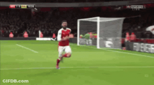 Soccer Player In Red Running Toward Goal GIF