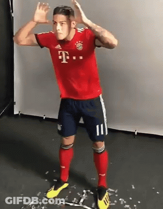 Soccer Player In Red Shirt And Blue Shorts GIF