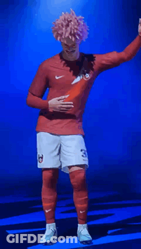 Soccer Player In Red Shirt And White Shorts Number 23 GIF