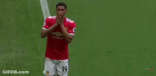 Soccer Player In Red Shirt And White Shorts GIF