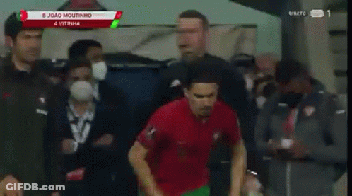 Soccer Player In Red Shirt Celebrating Goal GIF