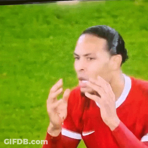 Soccer Player In Red Shirt Funny Face On TV GIF