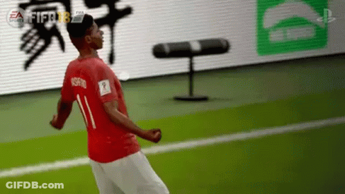 Soccer Player In Red Shirt Number 11 Jumping GIF
